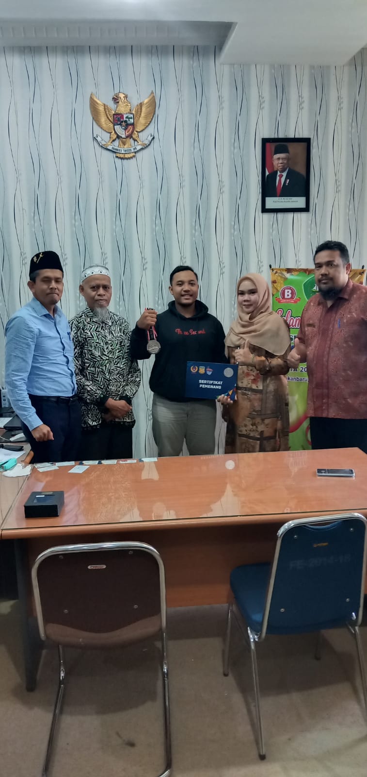 Cabang Angkat Berat di PON Papua, Mahasiswa Fekon Unilak Sumbang Medali Bagi Riau